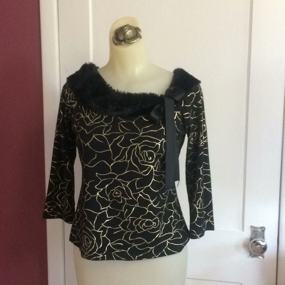 Interesting Bandeau gold accents off shoulder